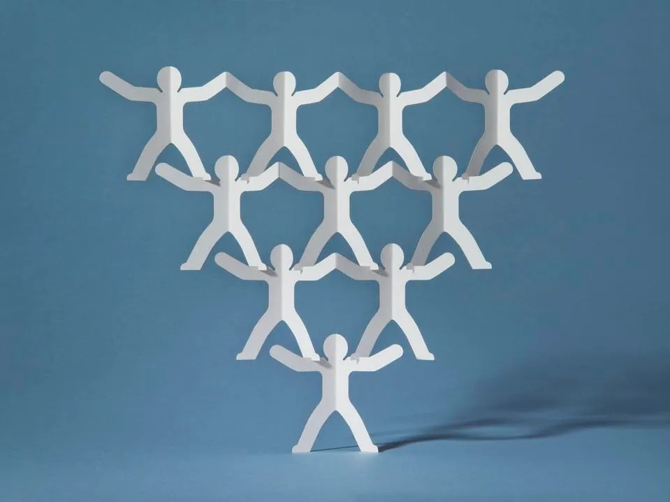 Paper People Pyramid Blue Background